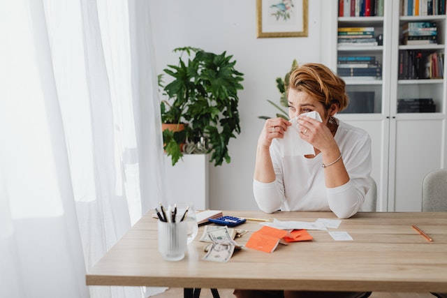 woman crying about student loans