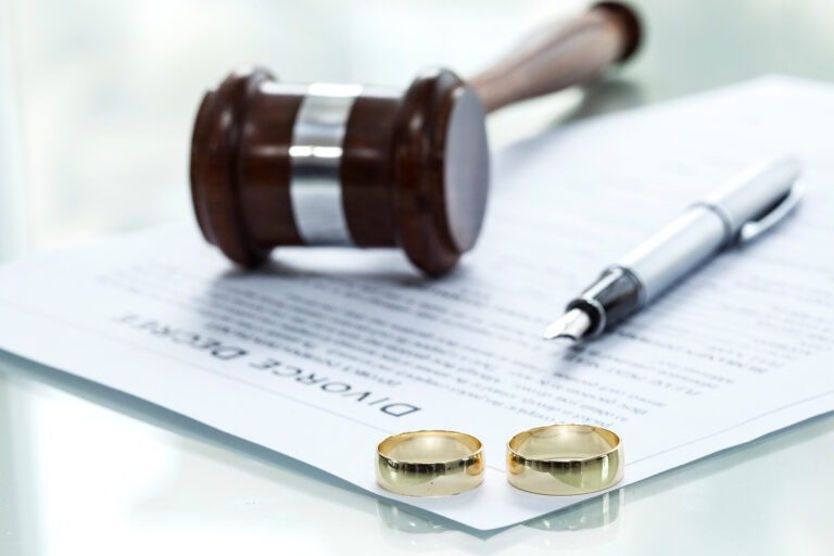 divorce papers wedding rings gavel