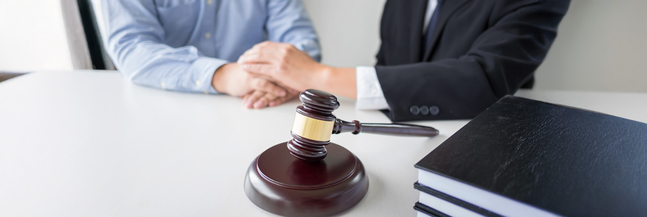 Judge gavel with lawyers advice legal at law firm in background. Concepts of law services